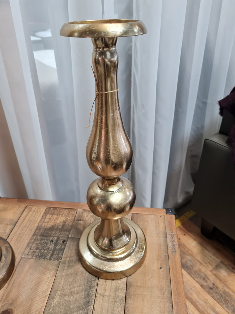 Tall candle stick holder in bronze