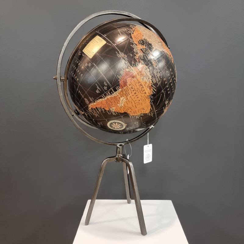 Large black globe on stand