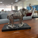 Silver coloured elephant bookends