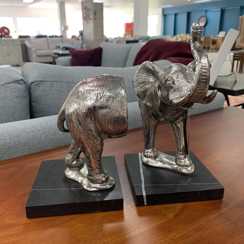 Silver coloured elephant bookends